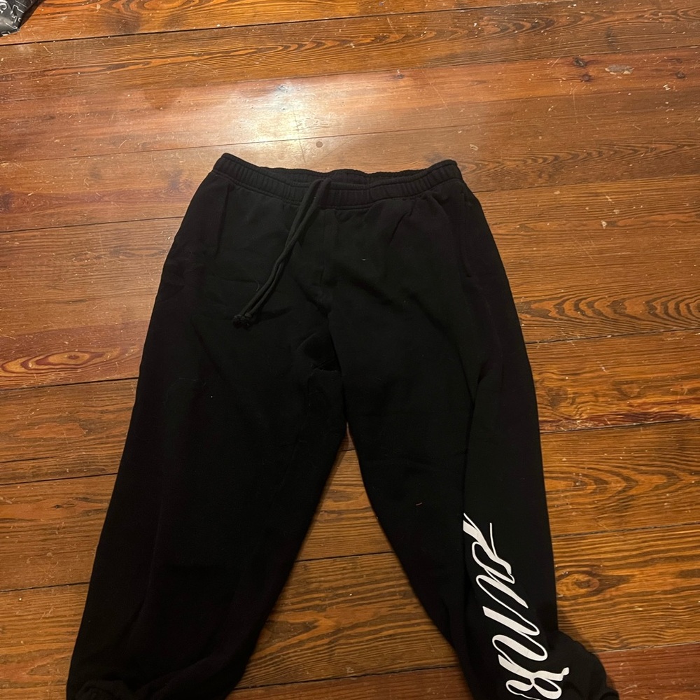 Black Joggers with White Script